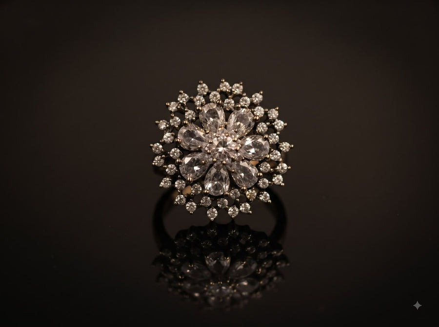 Antique gold zircon ring with floral design and sparkling stone detailing by Ziwara House